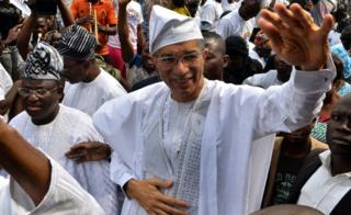 Benin's Prime Minister Lionel Zinsou, a French-Beninese investment banker, waves during a rally after being nominated to fly the party flag for the forthcoming presidential election in Cotonou, January 31, 2016