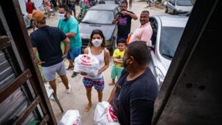 Food distribution in a favela in Rio, Brazil