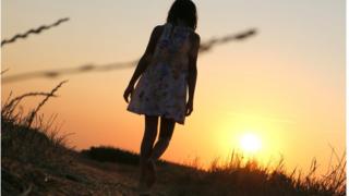 Anonymous girl walking away