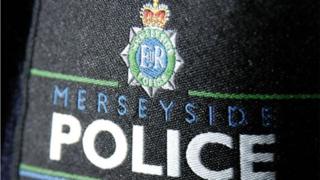 merseyside police charged assault officers arrest over copyright