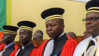 Congolese Special Prosecutor Toussaint Mutazini (right) sits with the five other judges of the Special Penal Court last Friday t the National Assembly in Bangui. The prosecutor and five judges of the Special Criminal Court (SPC), which is to investigate and prosecute crimes against humanity and war crimes committed in the Central African Republic since 2003, were sworn in on June 30,