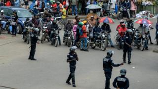 Police, okada men and people for street