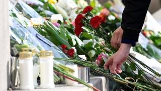 Floral tributes left outside the school in Malmo