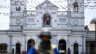 Soldiers stand guard outside St. Anthony"s Shrine in Colombo on April 25, 2019, following a series of bomb blasts