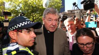 Image shows Cardinal George Pell arriving at court earlier this month