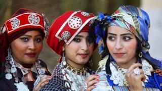 Libyan women attend the national day of the Libyan costume at the Martyrs Square in the capital Tripoli, on March 13, 2019