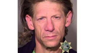 A photo from Portland Police showing suspect George Elwood Tschaggeny
