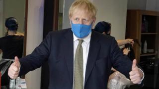 Boris Johnson wearing a face mask