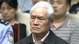 Zhou Yongkang attends his sentence hearing in a court in Tianji in China on 11 June 2015.