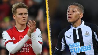 Arsenal's Martin Odegaard and Newcastle striker Dwight Gayle.