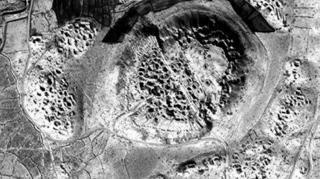 Satellite image showing pits in Afghan archaeological site, which researchers say have been dug by looters