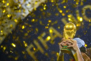 The World Cup trophy being lifted