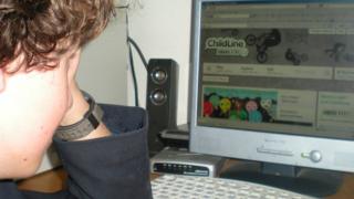 Boy looking at Childline website
