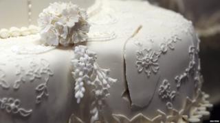 First cut of the royal wedding cake, which is going on show at Buckingham Palace