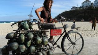 Bike with bronze coconut sculpures