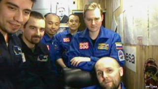 Members of the Mars500 crew (L-R) Diego Urbina of Italy, Romain Charles of France, Wang Yue of China, Sukhrob Kamolov of Russia, Alexander Smoleevskiy of Russia, Alexander Smoleevskiy of Russia,