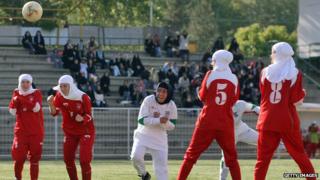 Muslim women playing football
