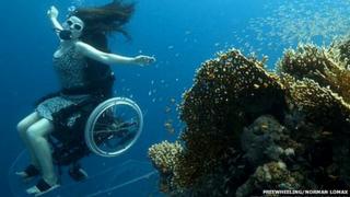 Self-propelled underwater wheelchair