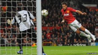 Man Utd player Javier Hernandez heading in a goal in match against Braga.