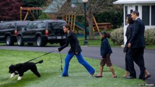 Obama family with dog