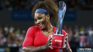 Serena Williams holding Brisbane International trophy