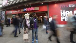 Shoppers outside HMV