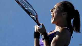 Heather Watson celebrates winning her second round match over Ksenia Pervak at the Australian Open