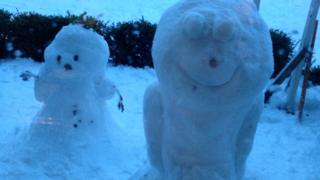 A snowman and snowalien.