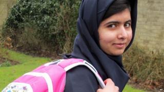 Malala with her schoolbag