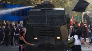 Chile Student Protests Resume As 100,000 March - BBC News