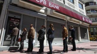 People queue for cash in Cyprus