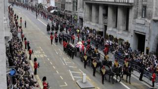 The funeral procession of former British prime minister, Margaret Thatcher, travels along Fleet Street to her funeral service.