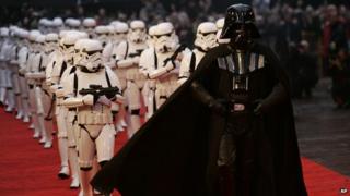 Darth Vader and storm troopers on the red carpet.