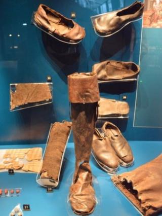 Shoes, a sock and a boot from the Mary Rose