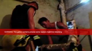 China rescuers save baby lodged in sewage pipe - BBC News