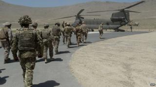 Soldiers boarding a helicopter in Kabul, Afghanistan