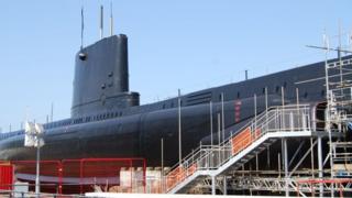 Prince William downs rum on HMS Alliance submarine visit - BBC News