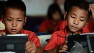 Children using tablets