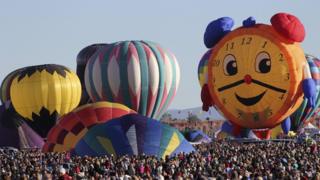 Crowds and balloons at the 42nd Albuquerque International Balloon Fiesta.