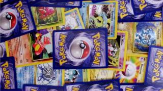 A pile of Pokemon cards.