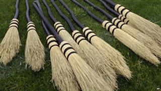 A pile of broomsticks