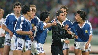 Argentina complain to referee Edgardo Codesal Mendez during the 1990 World Cup final