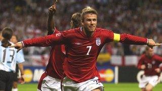 David Beckham celebrates after scoring a penalty for England against Argentina