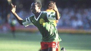 Roger Milla celebrates after scoring for Cameroon against Colombia