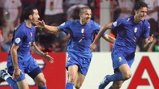 Italy celebrate after Fabio Grosso scores against Germany