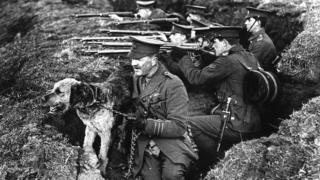 Captain Richardson with a dog in 1914