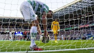 Mikel Lustig retrieves the ball as Celtic fall behind to Legia Warsaw