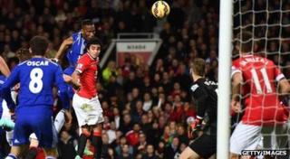 Chelsea's Didier Drogba scores against Manchester United