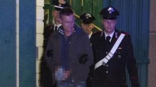 Italy arrests 44 in mafia migrant centre probe - BBC News
