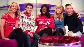 Newsround presenters in Christmas jumpers